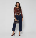 Jean Cropped Con Guardapolvo